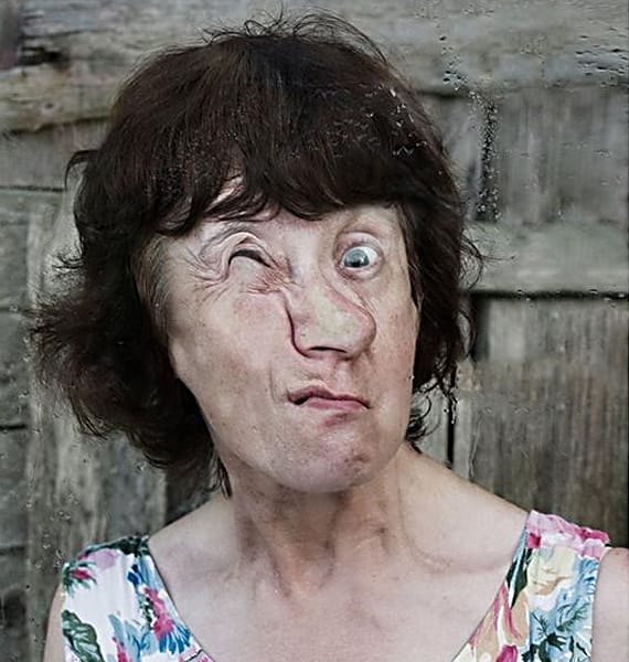The Ugly Truth: Photographs of Faces Against Glass