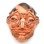 Face Sculptures Made Of Toys & Dolls