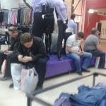 Men Waiting For Women Shopping