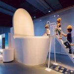 Children Dress As Poop & Jump In A Giant Toilet, Because Japan