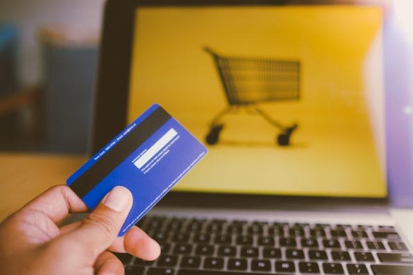 Comfort e-commerce shopping. Royalty high quality free photo image of shopping online and payment by credit card. Using laptop and mobile phone to online shopping and pay by visa credit card
