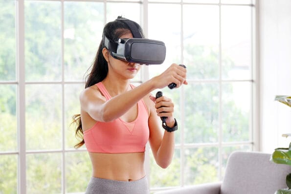 virtual reality E sport, Happy asian woman wearing virtual reality headset for interactive excercise at home, Asia girl playing vr while workout fitness, Female and wearable technology