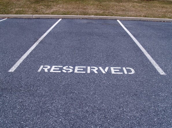 a reserved parking spot in a parking lot