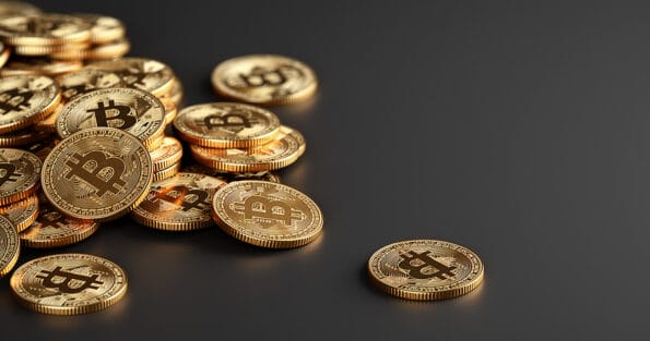 Bitcoin Crypto currency coins. BTC Gold bitcoin Bit Coins bitcoins on dark background. Bitcoins mining concept, Blockchain money technology. 3d illustration.